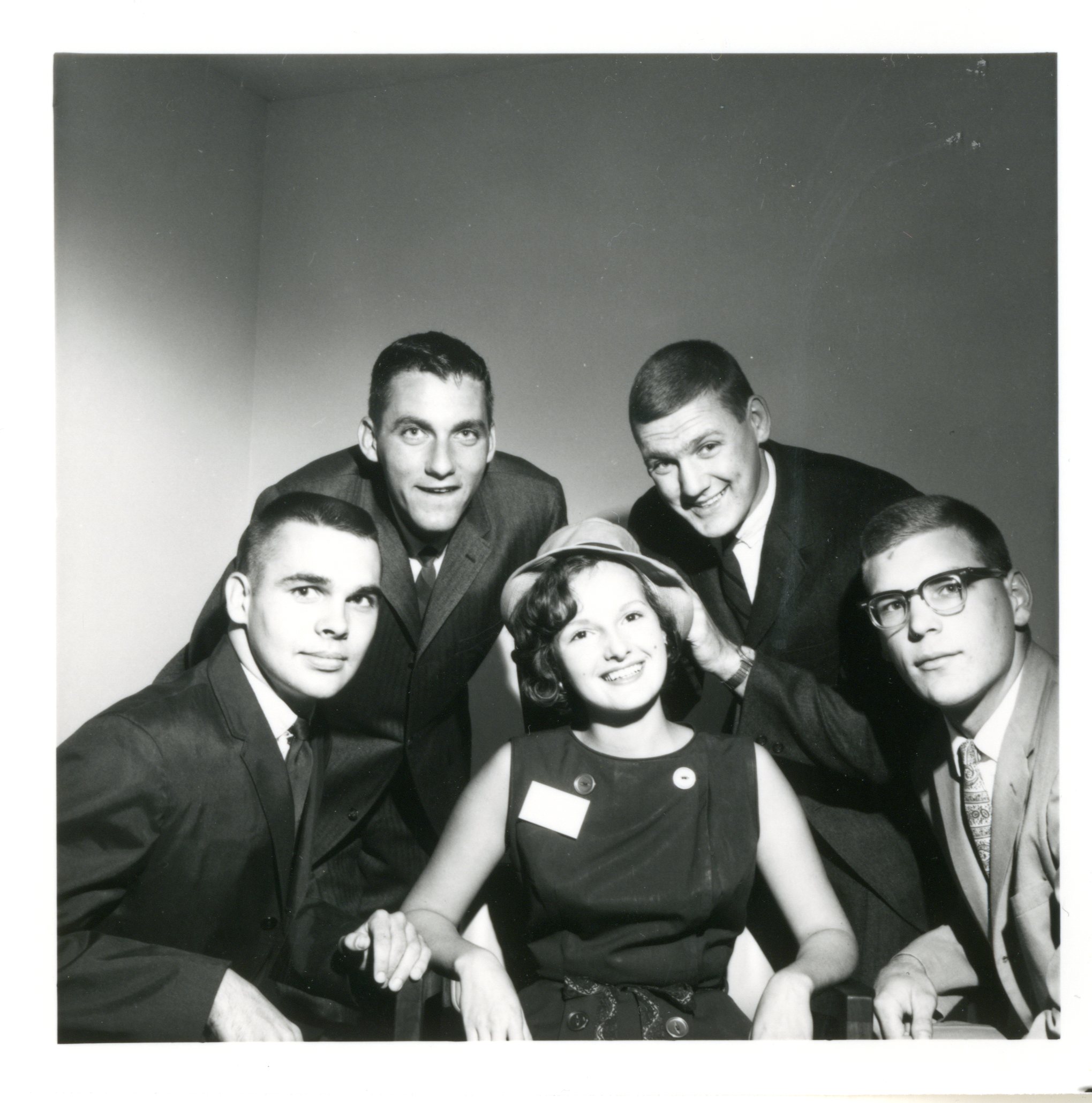 Coed with her ‘'Big Brothers,'’ 1964